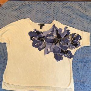 Cream top with blue floral design
